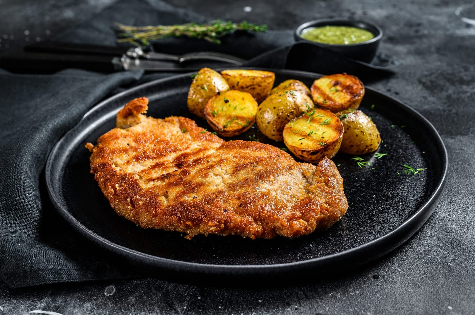 breaded-german-weiner-schnitzel-with-potatoes-bla-2023-11-27-05-12-43-utc